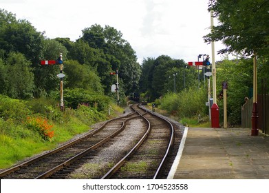 Railway tracks leading away from the station on a vintage historic railway