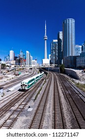 Railway Train At Toronto With Canada Tower As Background