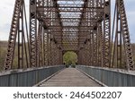 railway trestle bridge detail (steel and wooden crossing over croton reservoir) pedestrian walkway for biking cycling converted to rail trail (putnam railroad) yorktown heights new york (walking bike)