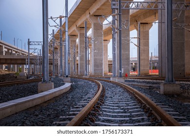 Railway Under Construction For Hi Speed Train Service With People Passenger In The City.