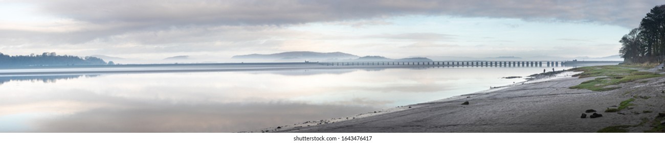 Railway Viaduct And The Misty Coastline Of Arnside, Cumbria