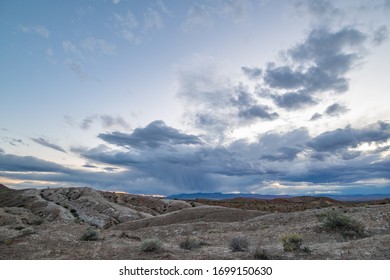 Rain Above Gypsum Hills In Gold Butte National Monument, Clark County, NV, USA