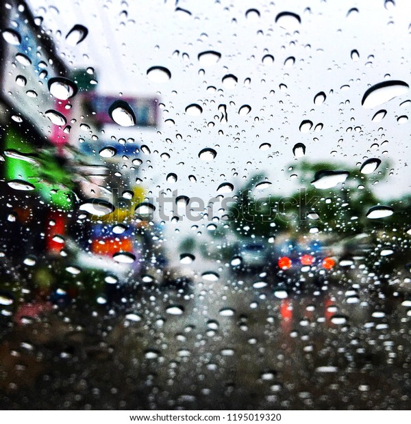 Rain with car\
glass