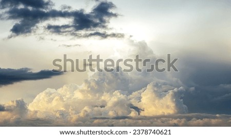 Rain clouds background with sunlight