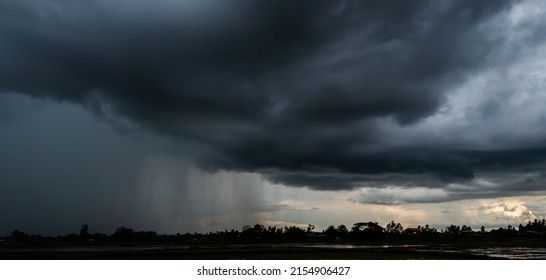 Rain Clouds And Black Sky Textured Background. Danger Storm Cloud, Black Cloud And Thunder Storm, Dark Sky And Motion Clouds Before Rainy.