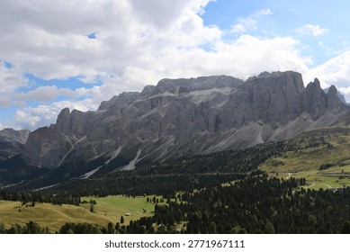 Rain clouds enveloping Dolomites alpine landscape