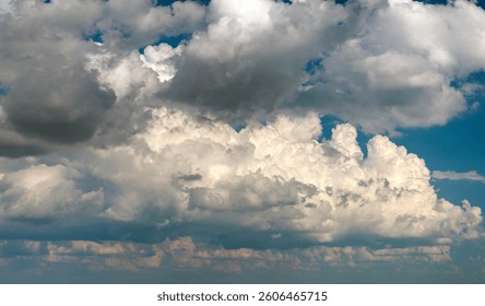 Rain clouds forming on blue Florida sky. Colorful summer skyscape