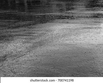 Rain Drop On Wet Asphalt Road Black And White Style