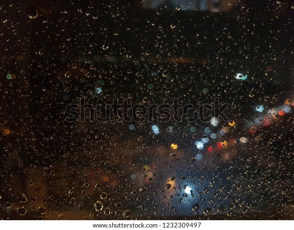 Rain drop on the window\
in the night 