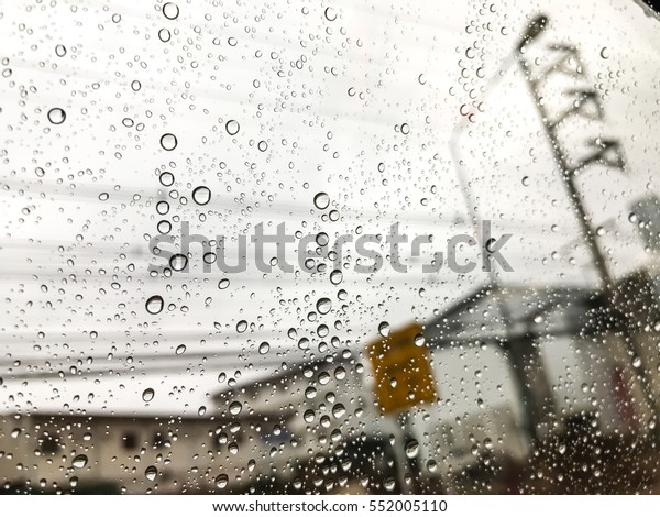 Rain Drop, Road view through car window blurry with\
rain, Driving in rain
