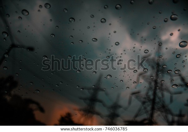 Rain droplets on car\'s\
window