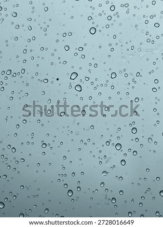 Rain droplets on a windshield 