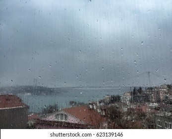 Rain Drops Against Bosporus In Istanbul, Turkey