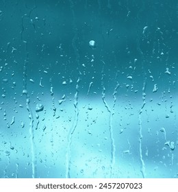 Rain drops close up on window glass outdoors. Texture of water in heavy rain. Gloomy autumn morning. Macro.	 - Powered by Shutterstock