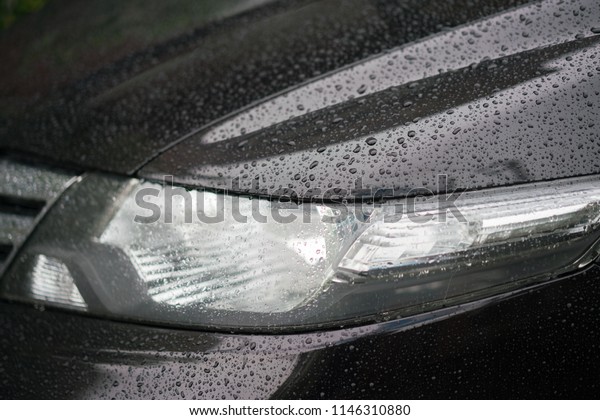Rain drops on\
a car after the rain, car\
accident