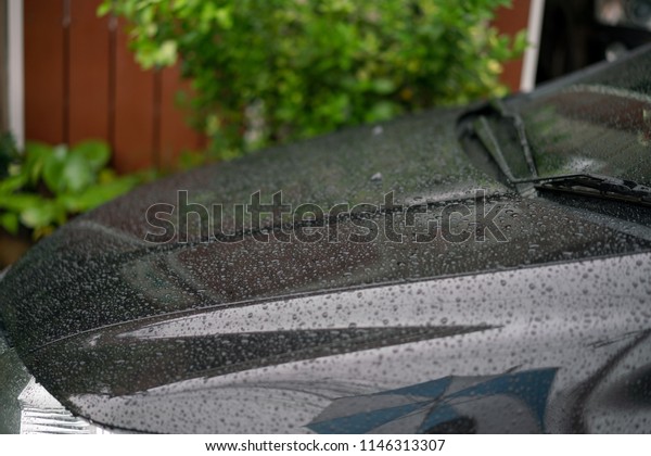 rain drops on a car and window after the rain,\
car accident