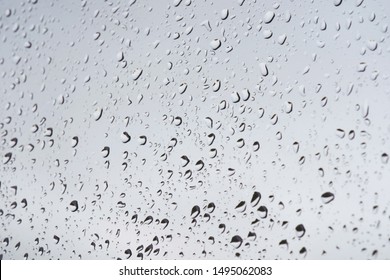 Rain Drops On Glass Widow Of A Car After The Rain