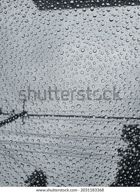Rain drops on sun roof of
the car