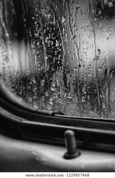 Rain Drops on the window of\
car 