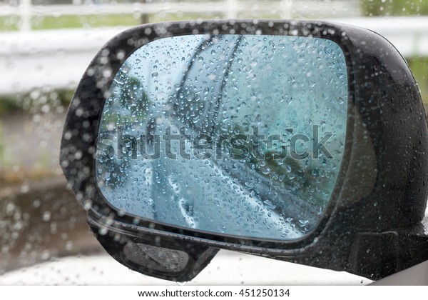 rain drops on window with\
car glass
