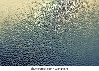 Rain Drops On The Window Glass In A Cloudy Day