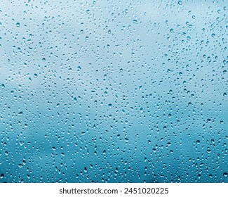 Rain drops on window glass, Natural Pattern of raindrops. Natural pattern of raindrops - Powered by Shutterstock