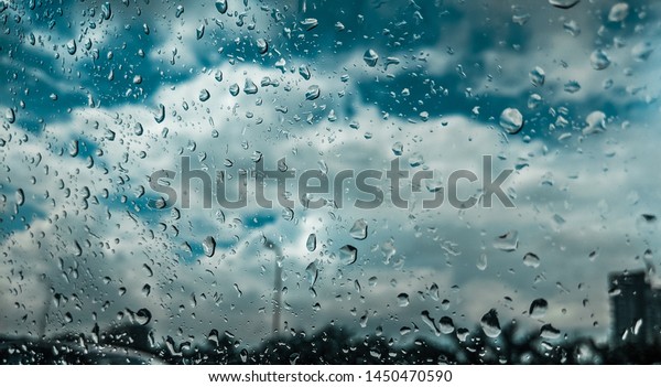 Rain drops on\
window, Monsoon, June , 2019, Kolkata, India, Asia, Day time, Sky\
is cleared after heavy rain\
