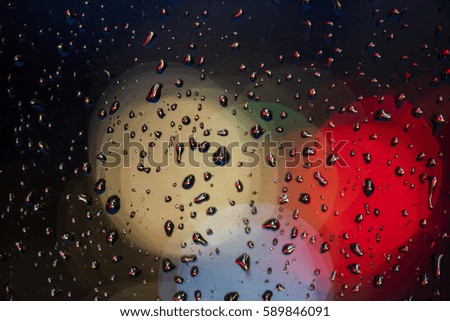 Similar – Drops on the window pane with reflection of the building opposite