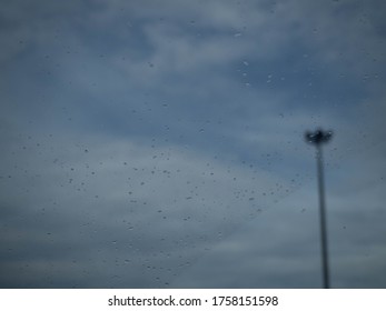 Rain falling on the windshield
