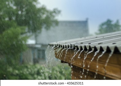 rain flows down from a roof down