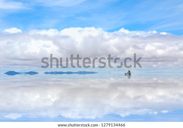 The rain
mirrors in uyuni flat desert -
Bolivia