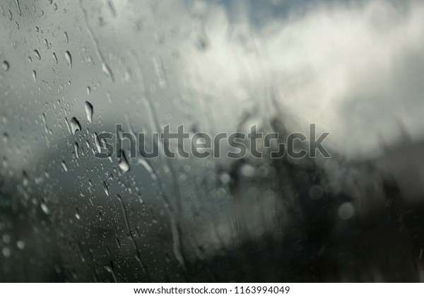 Rain on the car\
window