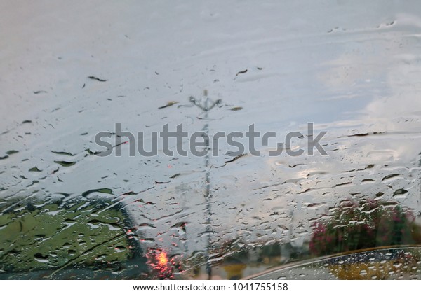 Rain on the car
window. Window wet after rain. Condensate on glass on blurred
background, defocused. Beautiful background, texture, abstract
pattern. After rain
concept.
