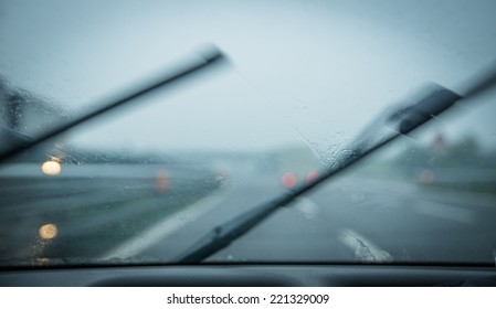 Rain On The Car Windshield. Focus On Rain Drops