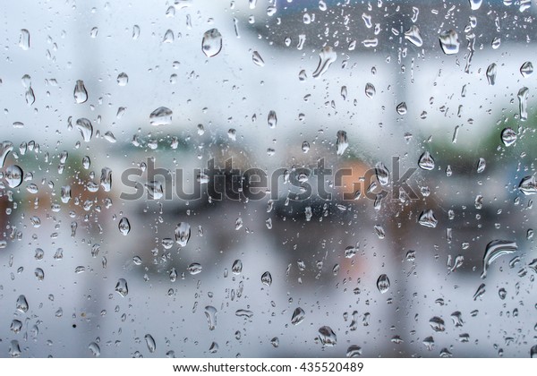 Rain on glass, Drops on the glass,rain drops on car\
glass in rainy days.