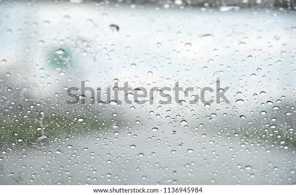 Rain on the windshield Make it look through the mirror\
to the ro