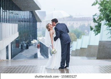 Rain Pours On A Wedding Day