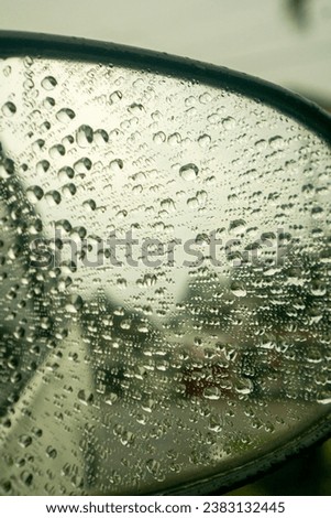 Rain reflection from car mirrors