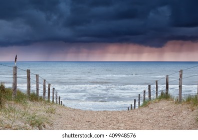 rain and storm coming from North sea to beach, Holland