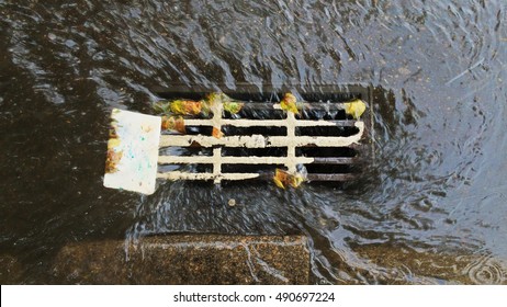 Rain Water Falling Into Sewerage After Downpour From The Top View, Steady Camera, Footage, Perfect For Film, Digital Composition, Projection Mapping