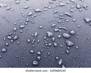 Rain Water Frozen On A Car Bonnet