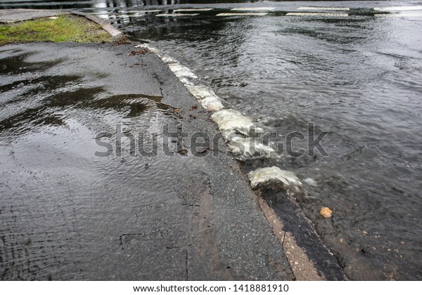 Rain Water Pushing Under Pavement Sidewalk Stock Photo (Edit Now ...