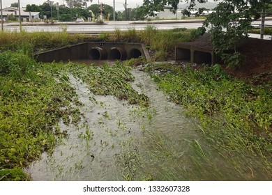 Rain Water Running Through Storm Water Drain During Monsoon Flood Event In Townsville Australia, Feb 2019.