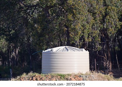 Rain Water Storage Tank In A Farm Field In Western Australia.