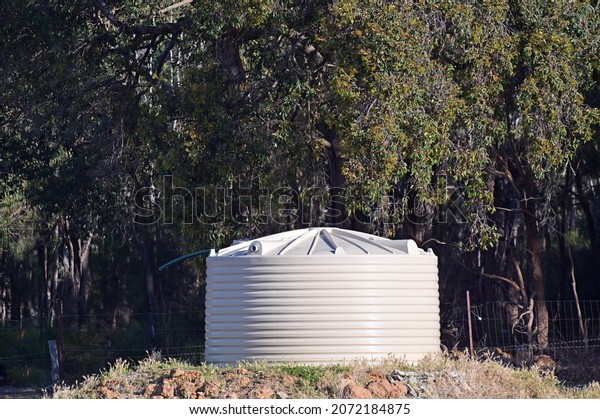 Rain water storage tank in a farm field in
Western Australia.