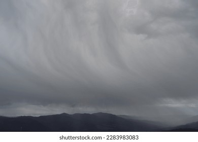 Rain and wind. An intersing cloud
