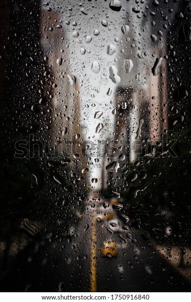 Rain from the window of a
car