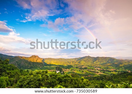 Rainbow after rain with Mountain Background , Landscape at Phu Langka, Payao Province, Thailand