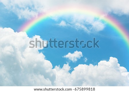 Rainbow in Blue sky with cloud.