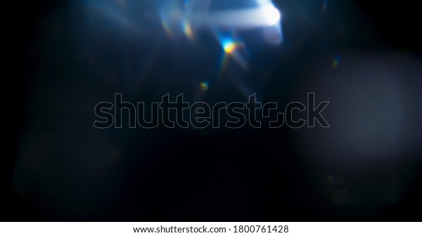 Rainbow Bokeh Prism Rainbow Light Flares\
Overlay on Black\
Background